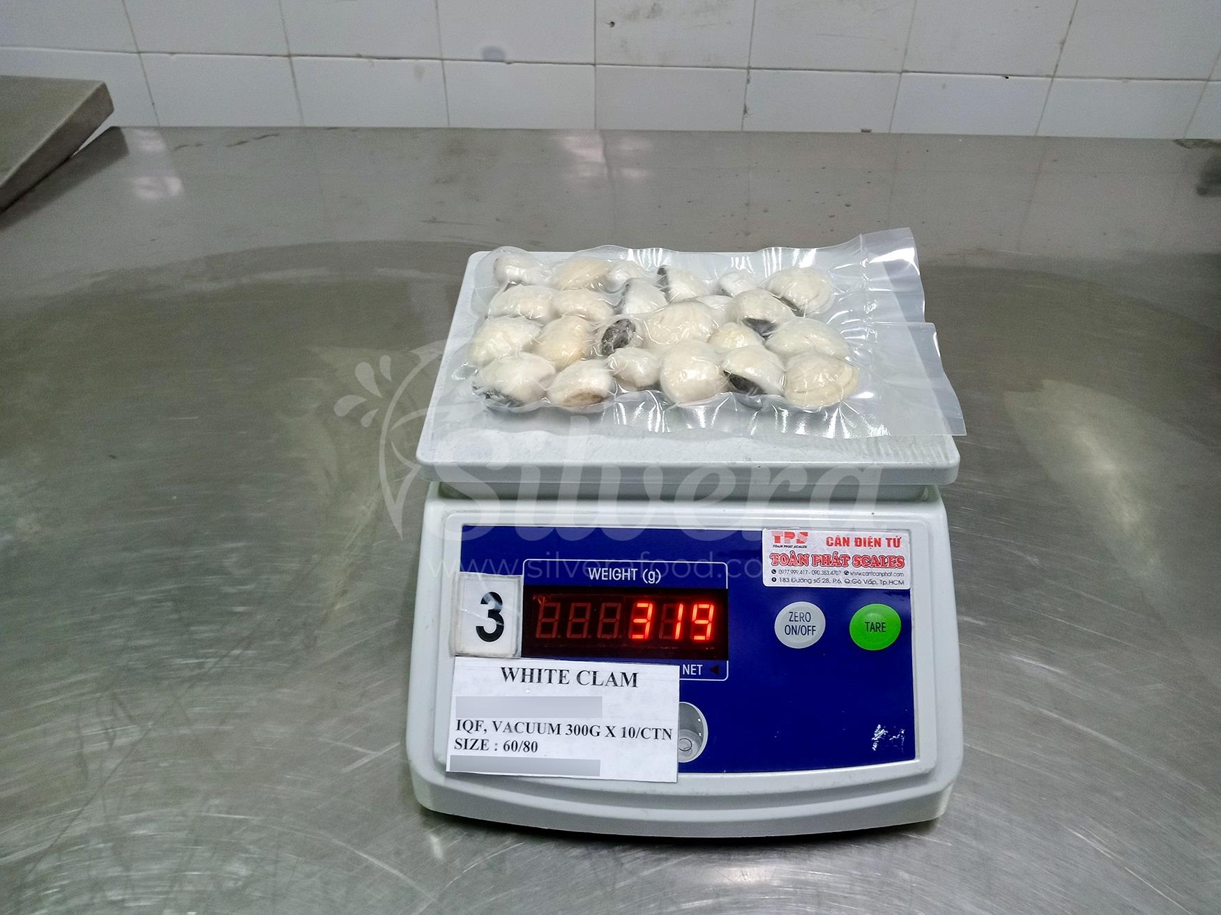 Vacuum packed bags of fully cooked whole white clams