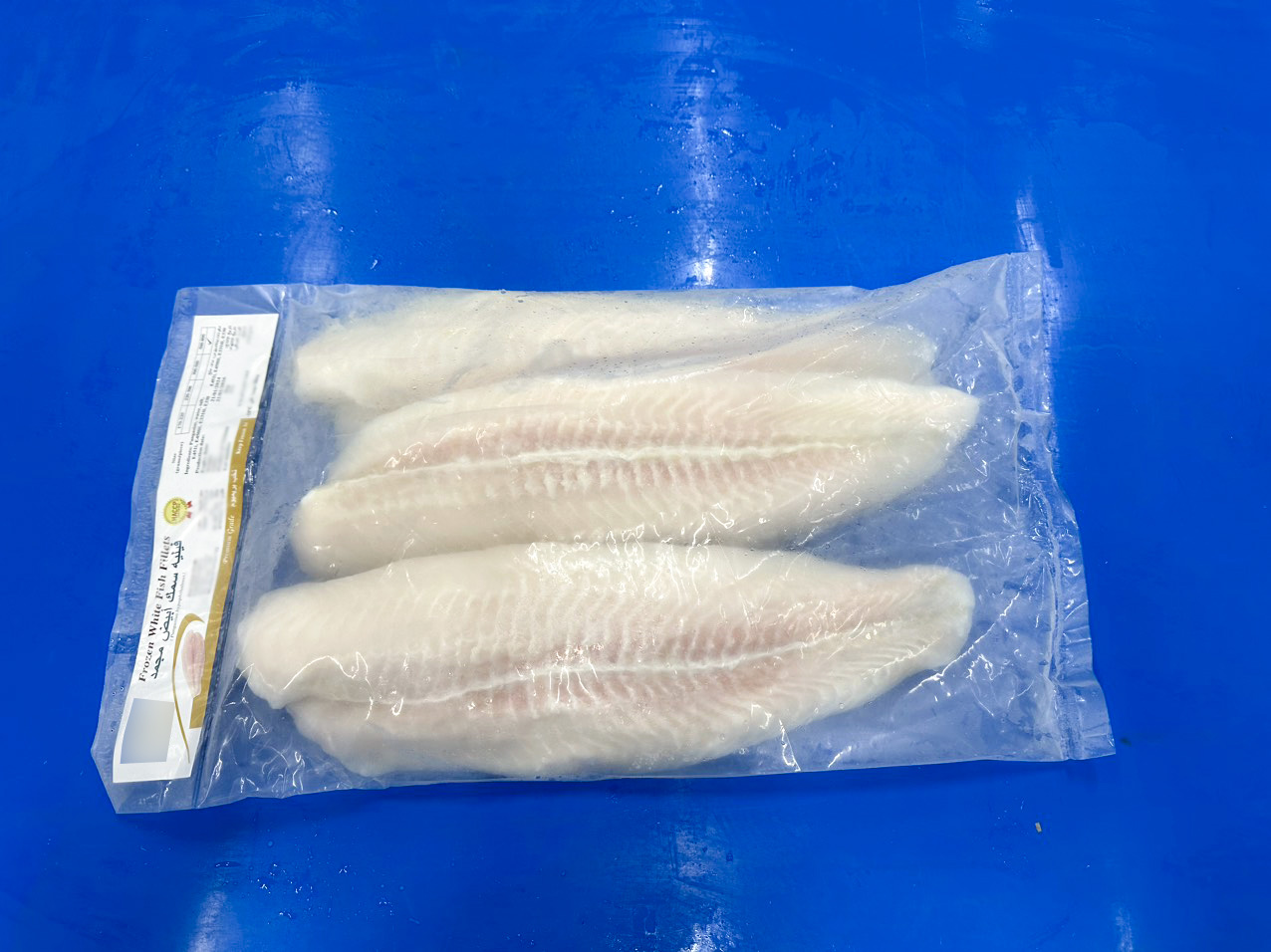 Frozen pangasius packed in a plain bag