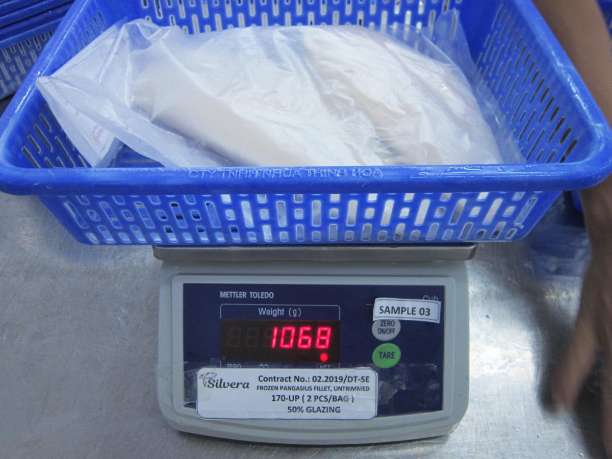 Checking Gross Weight Of The Products With Packaging