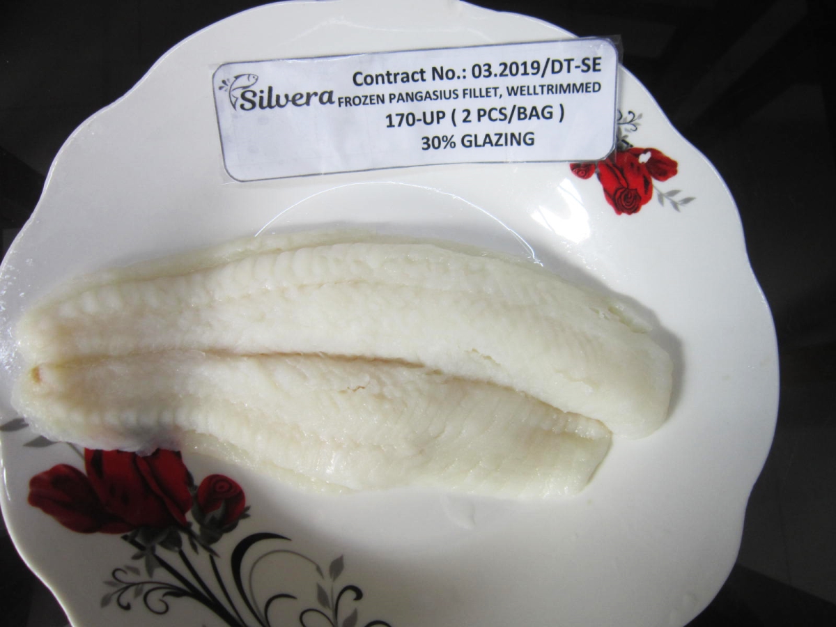 Checking Flavor Of A Cooked Pangasius Well-trimmed Fillet