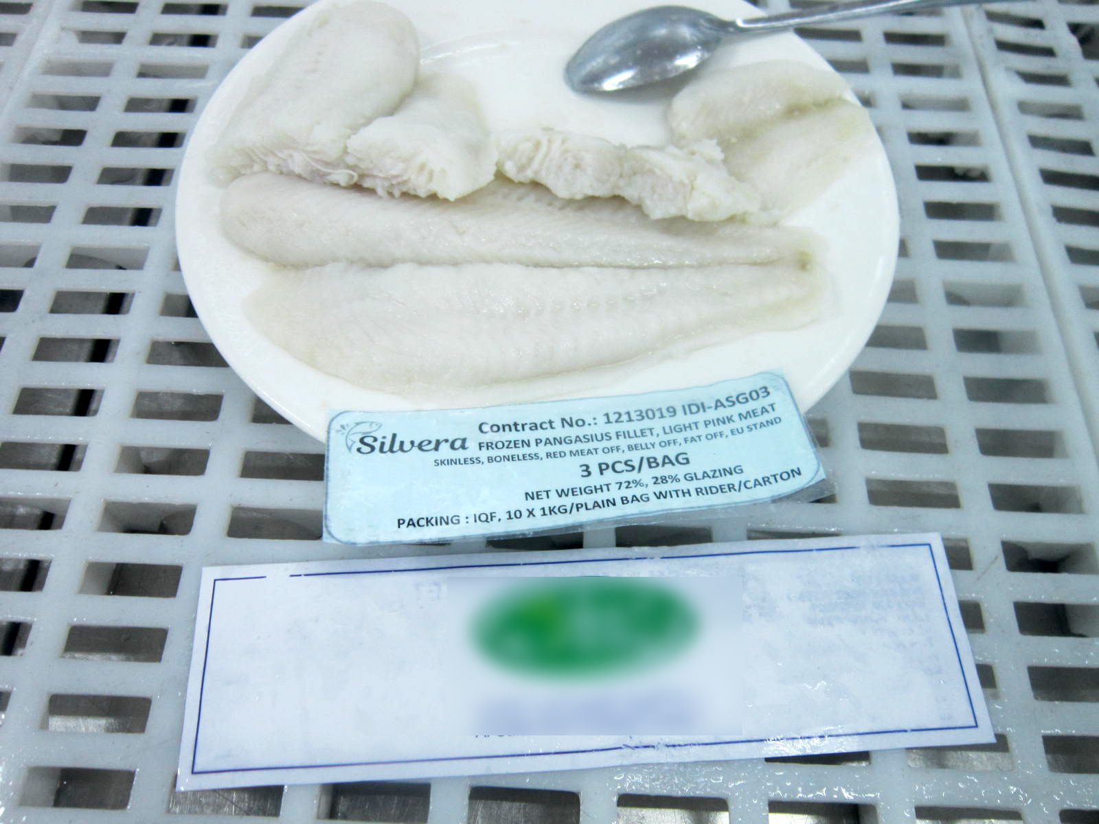 Checking Taste Of Steamed Pangasius Fillets Checking Taste Of Steamed Pangasius Fillets