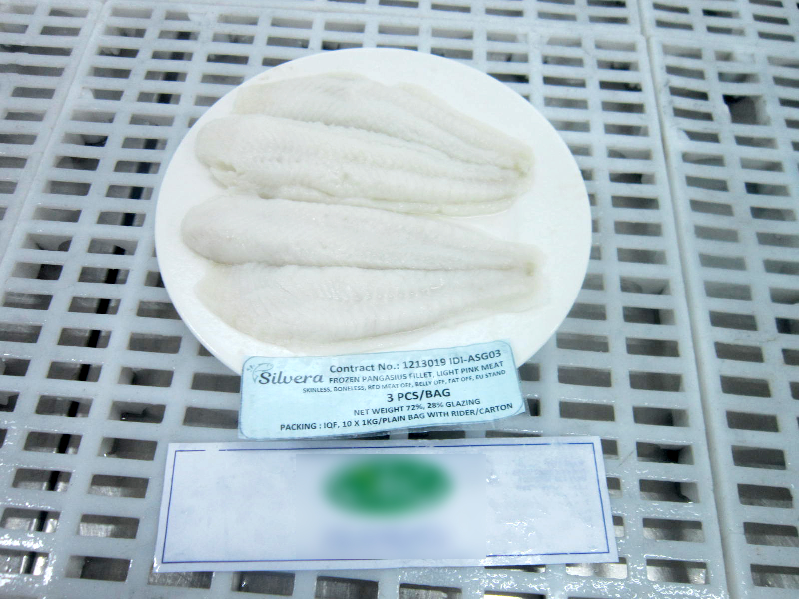 Checking Taste Of Steamed Pangasius Fillets Checking Taste Of Steamed Pangasius Fillets