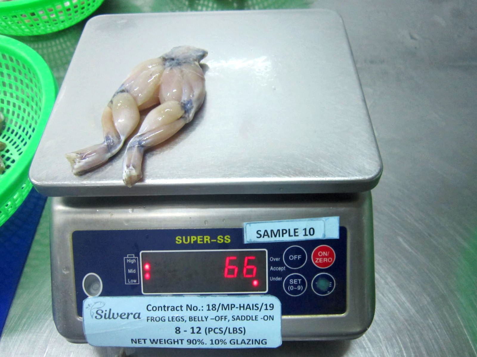 Checking Net Weight Of Some Random Thawed Frog Legs Checking Net Weight Of Some Random Thawed Frog Legs