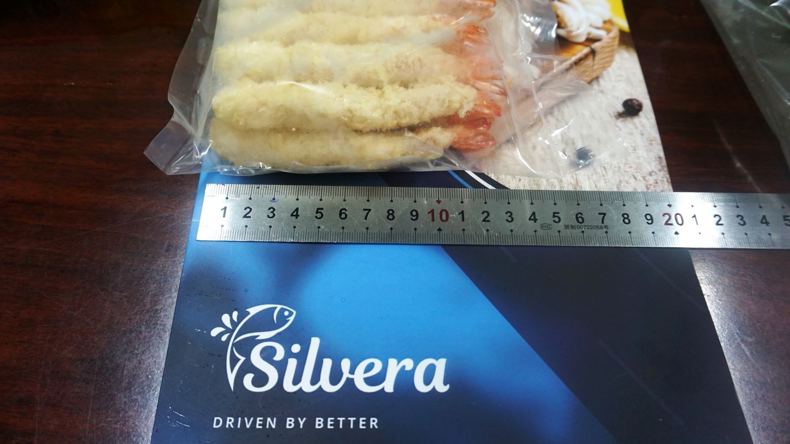 Measuring Length Of Pre-fried Torpedo Vannamei Shrimp. Credit: Silvera Food