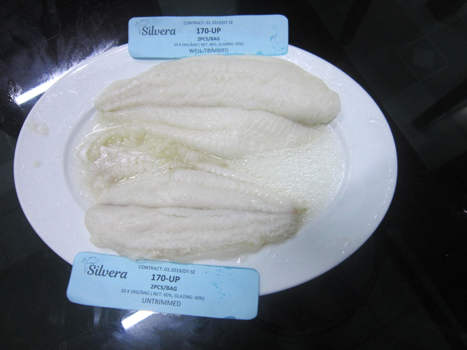 Checking Flavor Of Cooked Pangasius Untrimmed Fillets Checking Flavor Of Cooked Pangasius Untrimmed Fillets